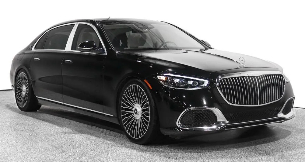 Black Mercedes-Maybach S-Class, front three-quarter view