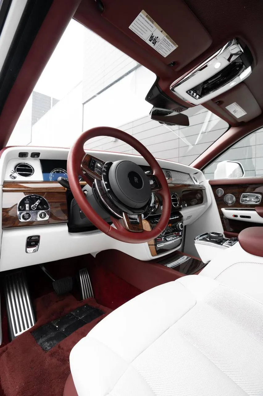 Rolls-Royce Phantom driver's cockpit with red leather and wood