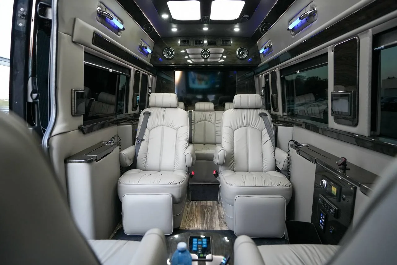VIP Sprinter cabin with four leather captain's chairs