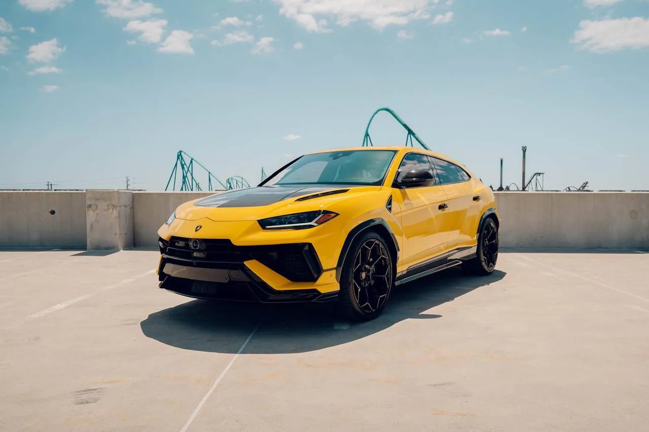 Yellow Lamborghini Urus on a rooftop